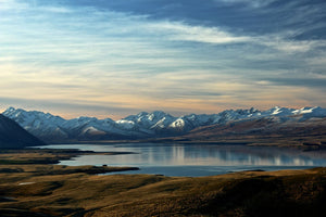 Lake Tekapo landscape, snow mountains and calm lake, New Zealand