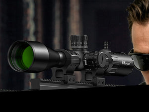 EZSHOOT rifle scope mounted on a rifle, close-up view of optic and adjustment turrets with shooter partially visible