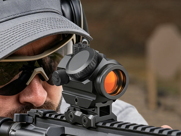 Close-up of a shooter aiming a rifle with a EZSHOOT red dot sight at an outdoor shooting range.