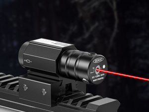 EZSHOOT laser bore sight projecting a red beam from a rifle-mounted device toward a target