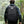 Person wearing a black backpack -EZshoot 40L Molle Rucksack Assault Pack for Men Women