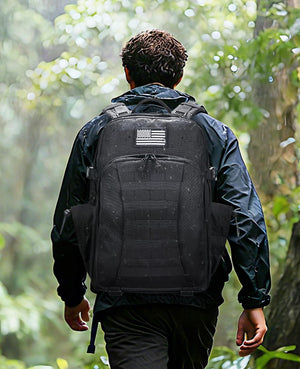 Person wearing a black backpack -EZshoot 40L Molle Rucksack Assault Pack for Men Women